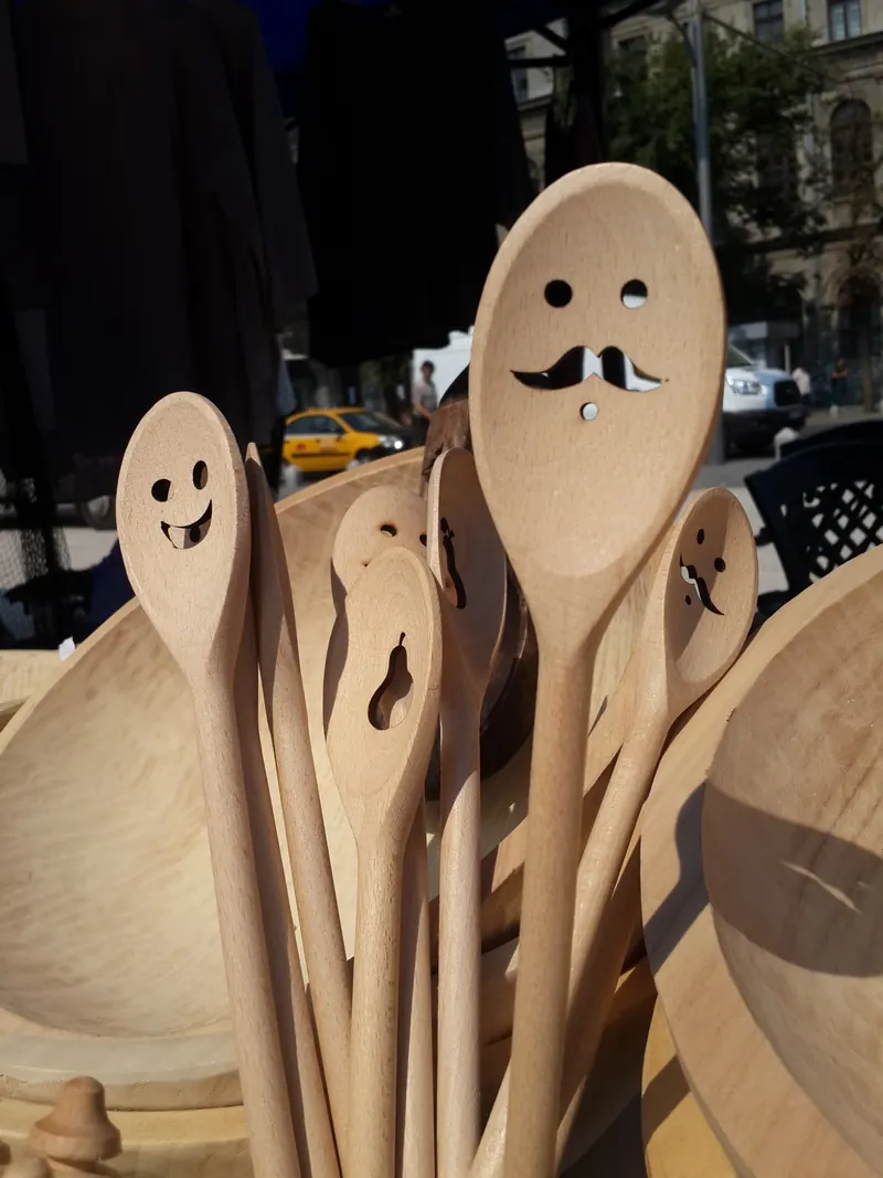 Wooden spoons with carved smiling faces