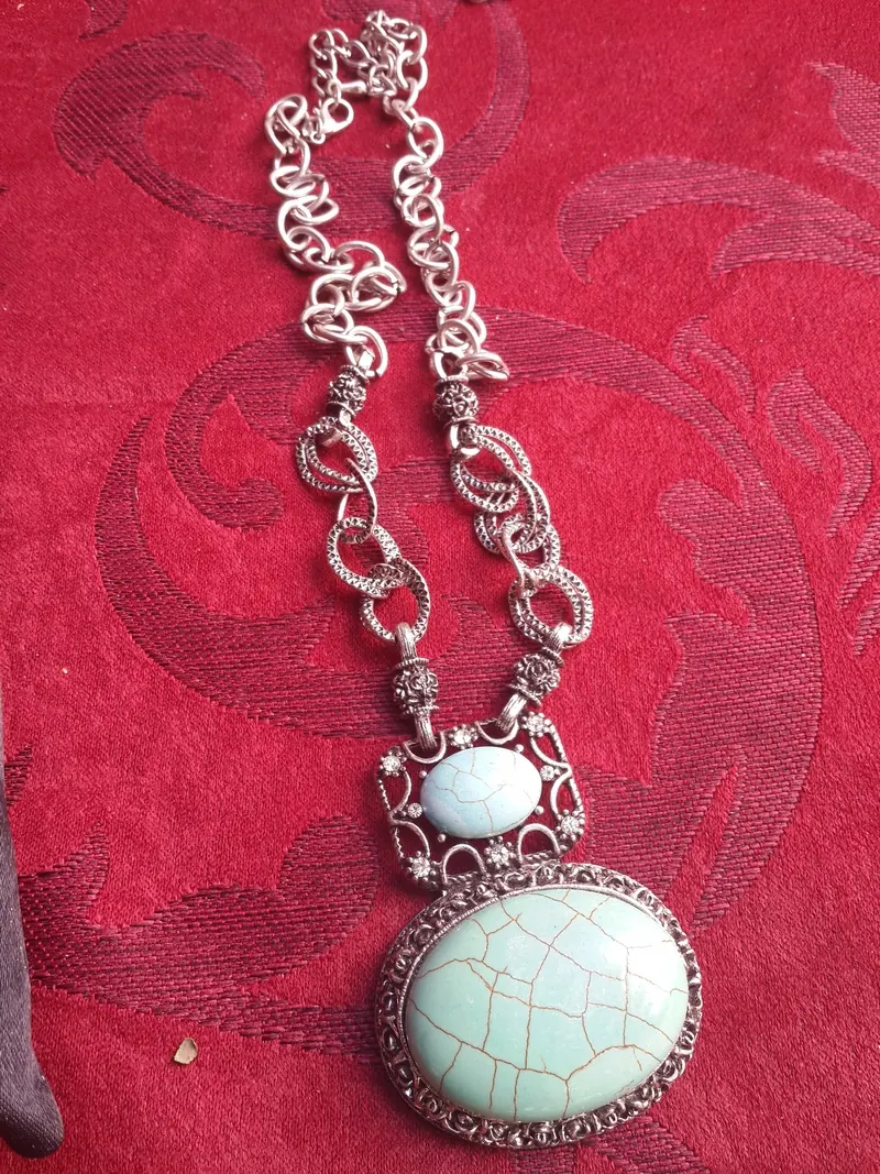 Silver necklace with a turquoise stone