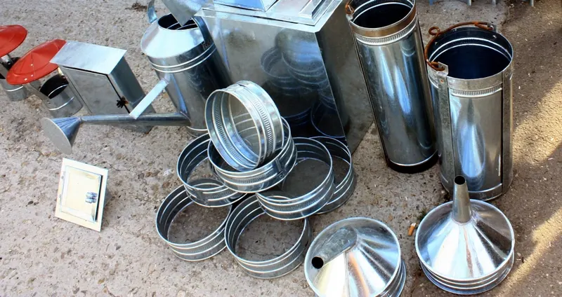 Galvanised sheet-metal pipes, buckets and funnels